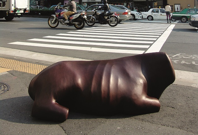 Cow benches leather seat in the shape of a cows body ICON